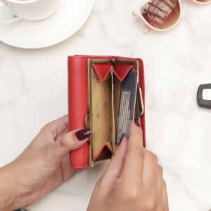 The classic Clip Frame Coin Section adds both elegance and functionality, making this purse a stylish and secure choice for everyday use.