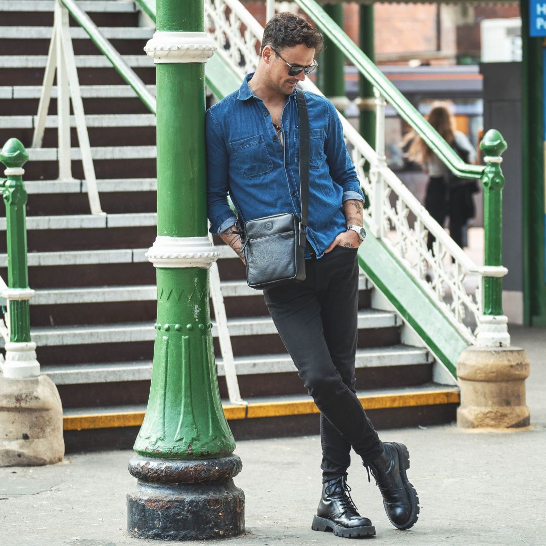 Black leather man bag flight bag.