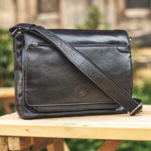 Orion Black Messenger Bag - 2004 black leather messenger bag with an embossed front, there is a long crossbody strap.