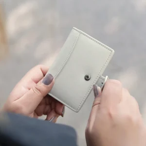 Light Grey RFID-Blocking Leather Card Organiser 6 soft leather RFID card organiser. Designed for women, it offers 6 card slots, a 15-card plastic insert, and RFID-blocking technology to keep your data secure.