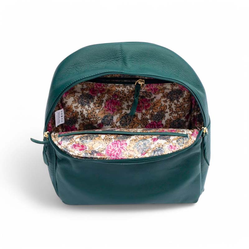 soft leather backpack shown with floral fabric interior – stylish and practical